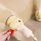 Adorable poisson rouge avec ventouse pour presser le dentifrice