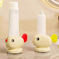 Adorable poisson rouge avec ventouse pour presser le dentifrice